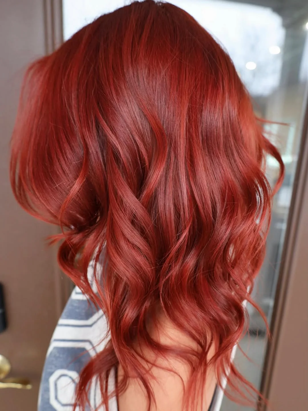 chic summer auburn hair color 2026 Bright Copper Red Hollywood Waves