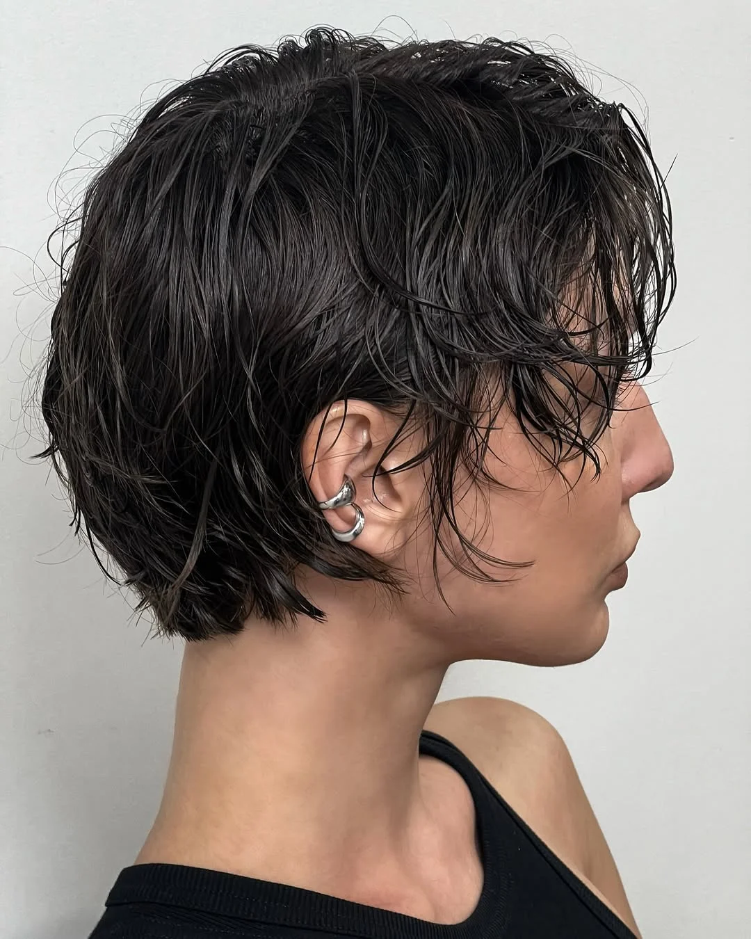 chic summer haircuts for women over 40 2026 Edgy Modern Short Pixie with Wet Texture
