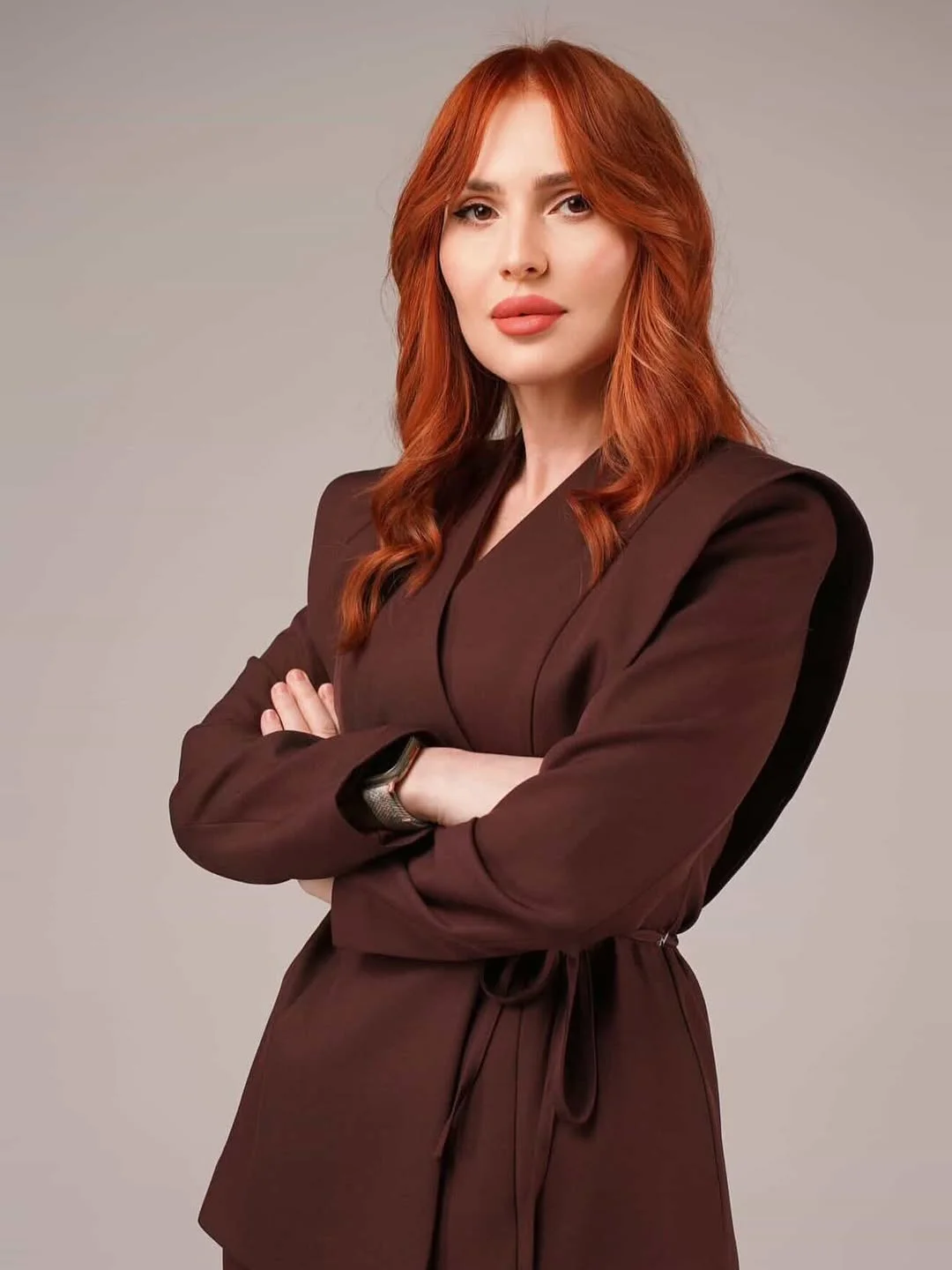 chic summer haircuts for women over 40 2026 Polished Copper Mid Length with Soft Waves