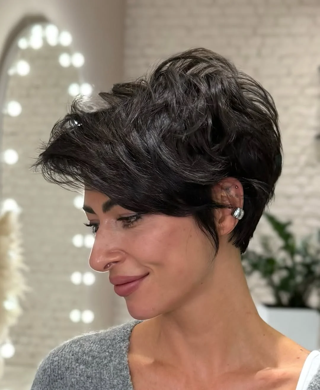 chic summer haircuts for women over 40 2026 Textured Modern Short Pixie with Volume
