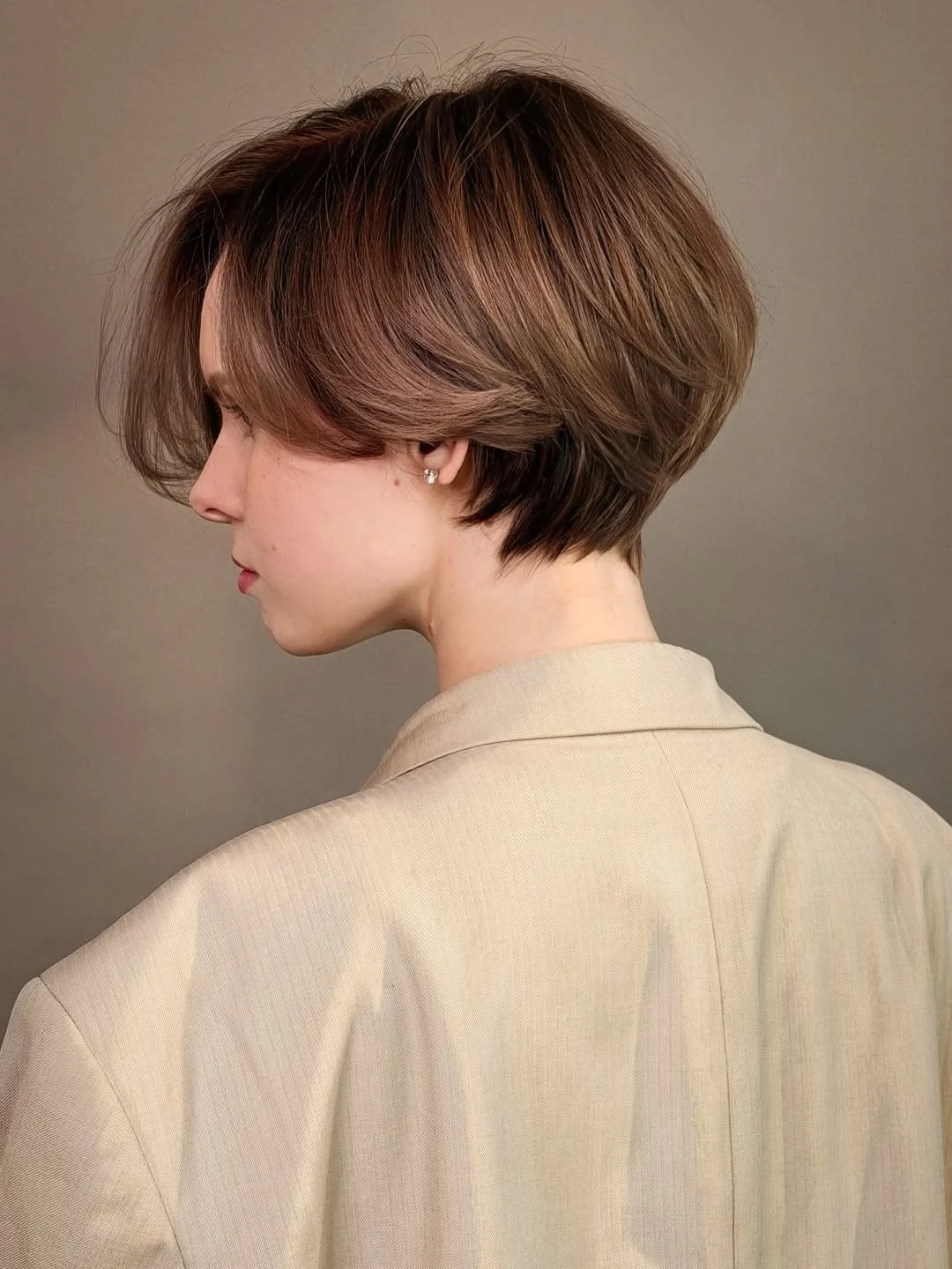 chic summer haircuts for women over 40 2026 Layered Short Cut with Tapered Nape