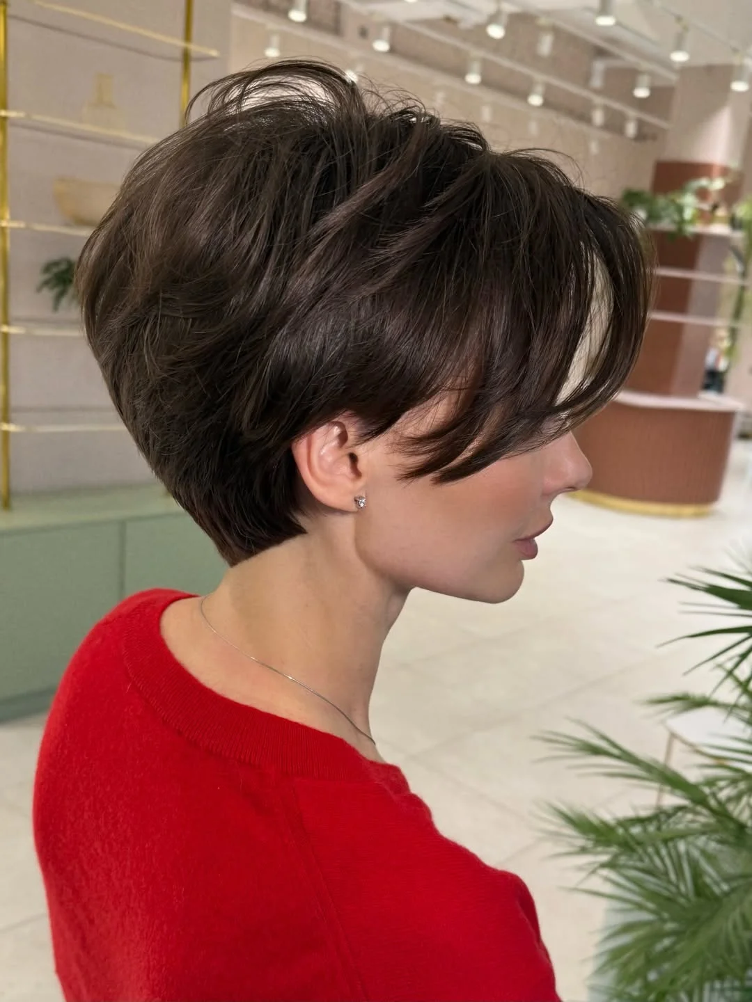 chic summer haircuts for women over 40 2026 Voluminous Modern Short with Sweeping Bangs