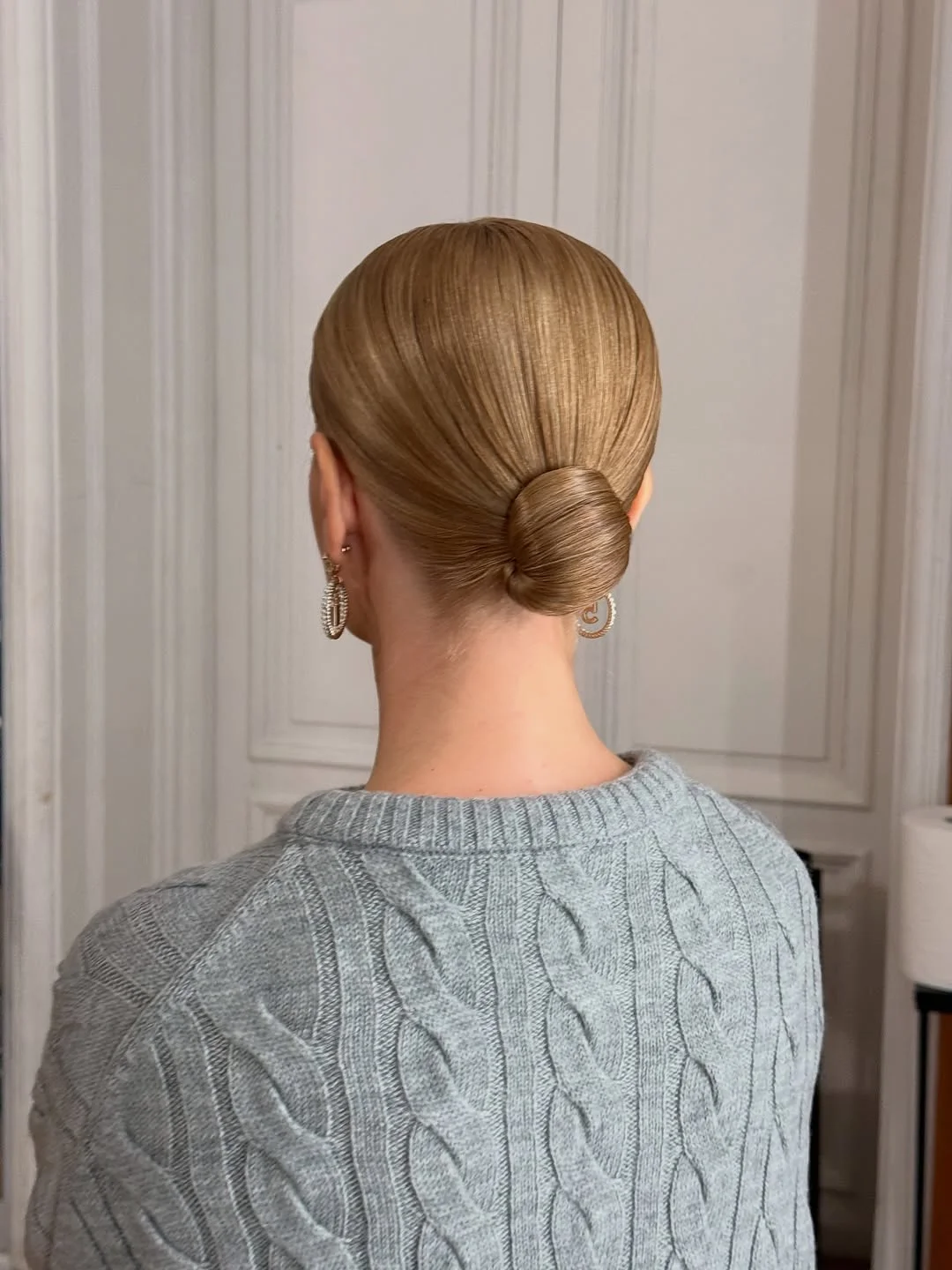 effortless summer quick hairstyles 2026 Classic Slick Bun With Summer Glow Finish
