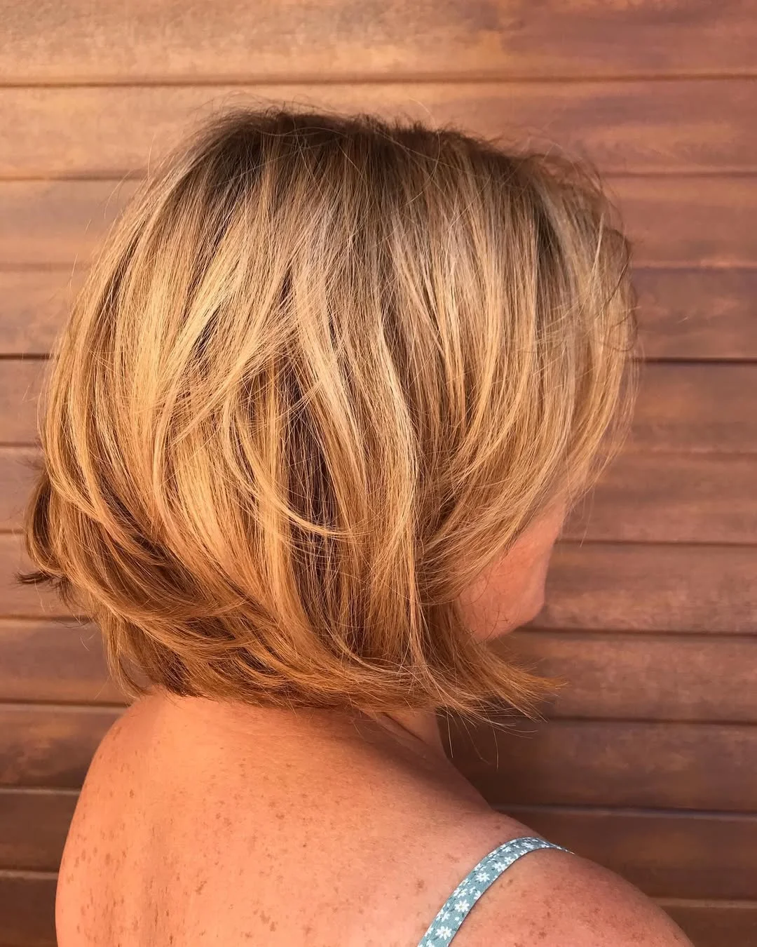elegant summer haircuts for women over 60 2026 Sunlit Layered Bob with Movement