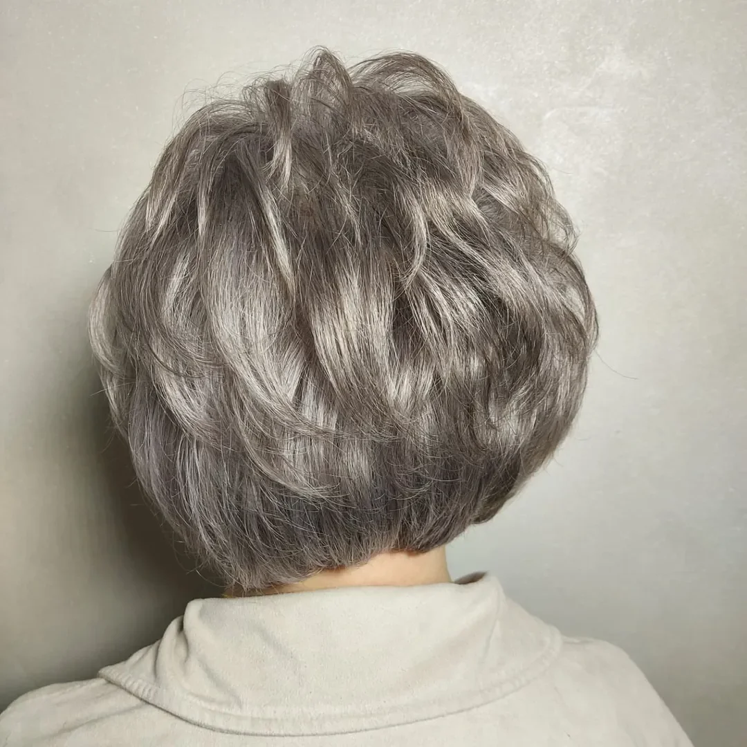 elegant summer haircuts for women over 60 2026 Voluminous Silver Textured Bob