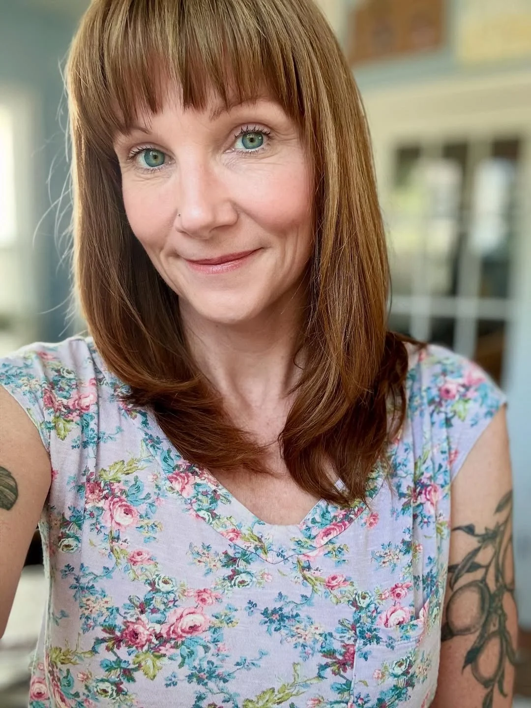 elegant summer haircuts for women over 60 2026 Long Layered Cut with Soft Bangs
