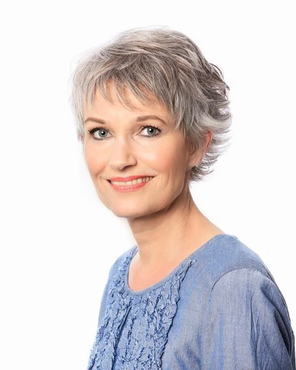 elegant summer haircuts for women over 60 2026 Soft Feathered Short Pixie with Airy Texture