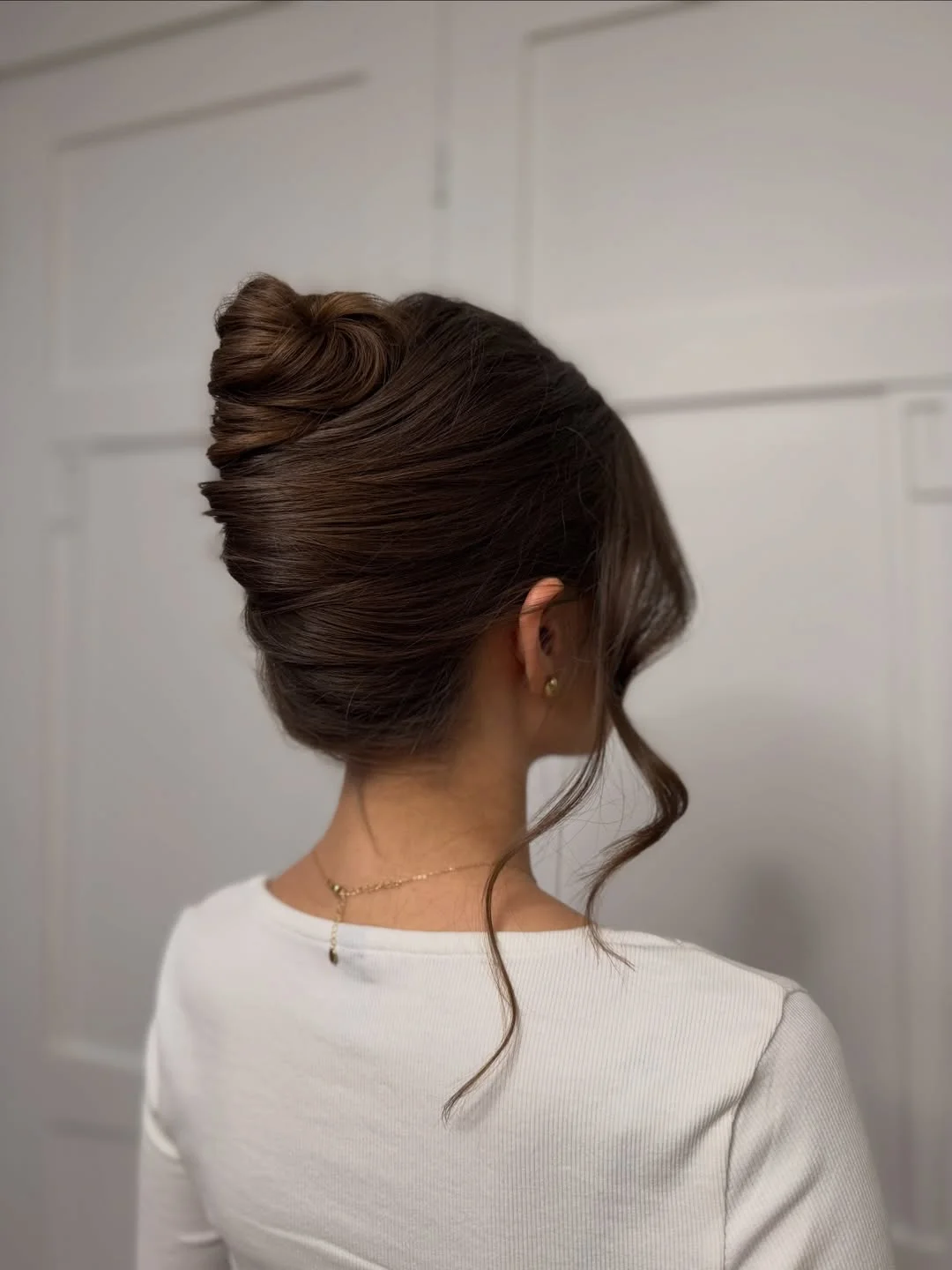 elegant summer updo hairstyles 2026 Sleek Low Bun with Minimalist Finish