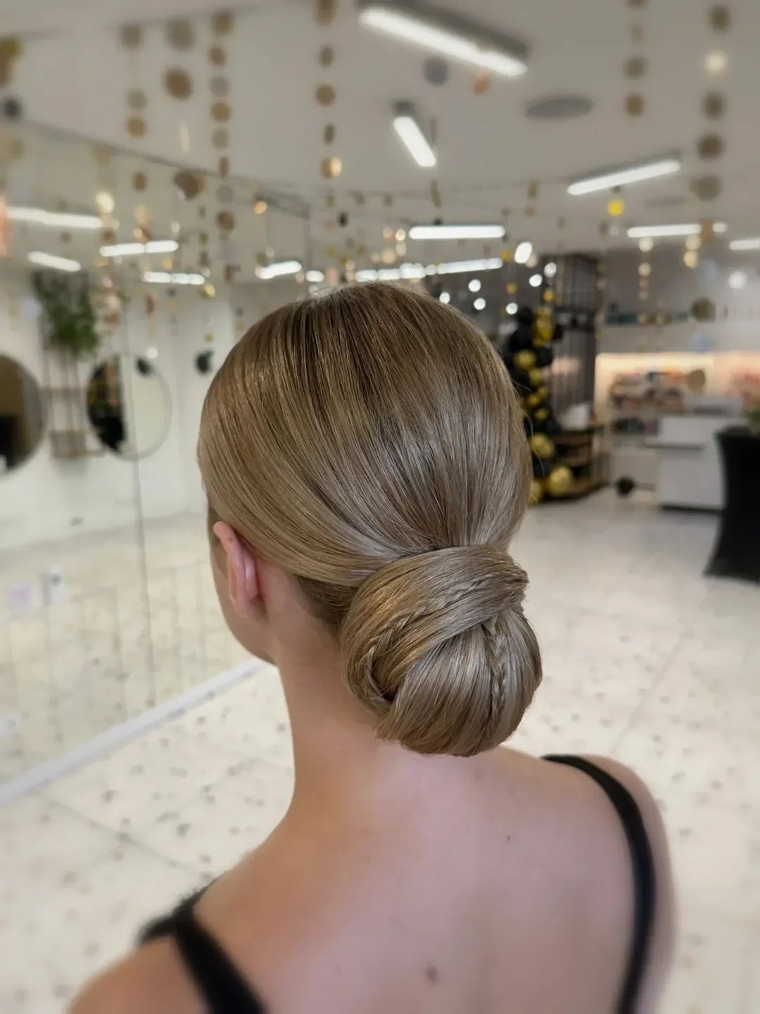 elegant summer updo hairstyles 2026 Sleek Folded Low Knot for Polished Days