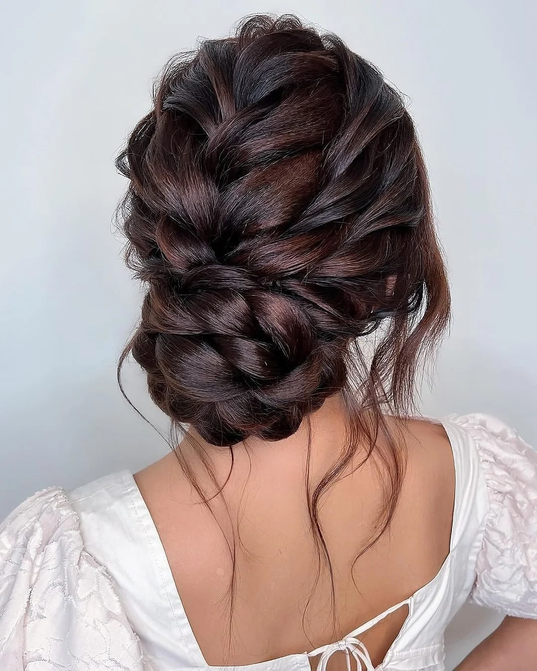 elegant summer updo hairstyles 2026 Textured Braided Updo with Soft Volume