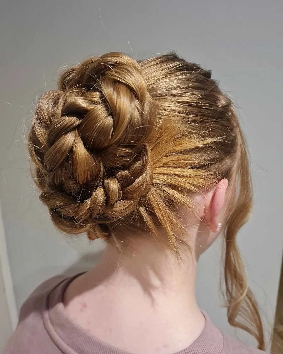elegant summer updo hairstyles 2026 Braided Low Bun with Soft Face Framing