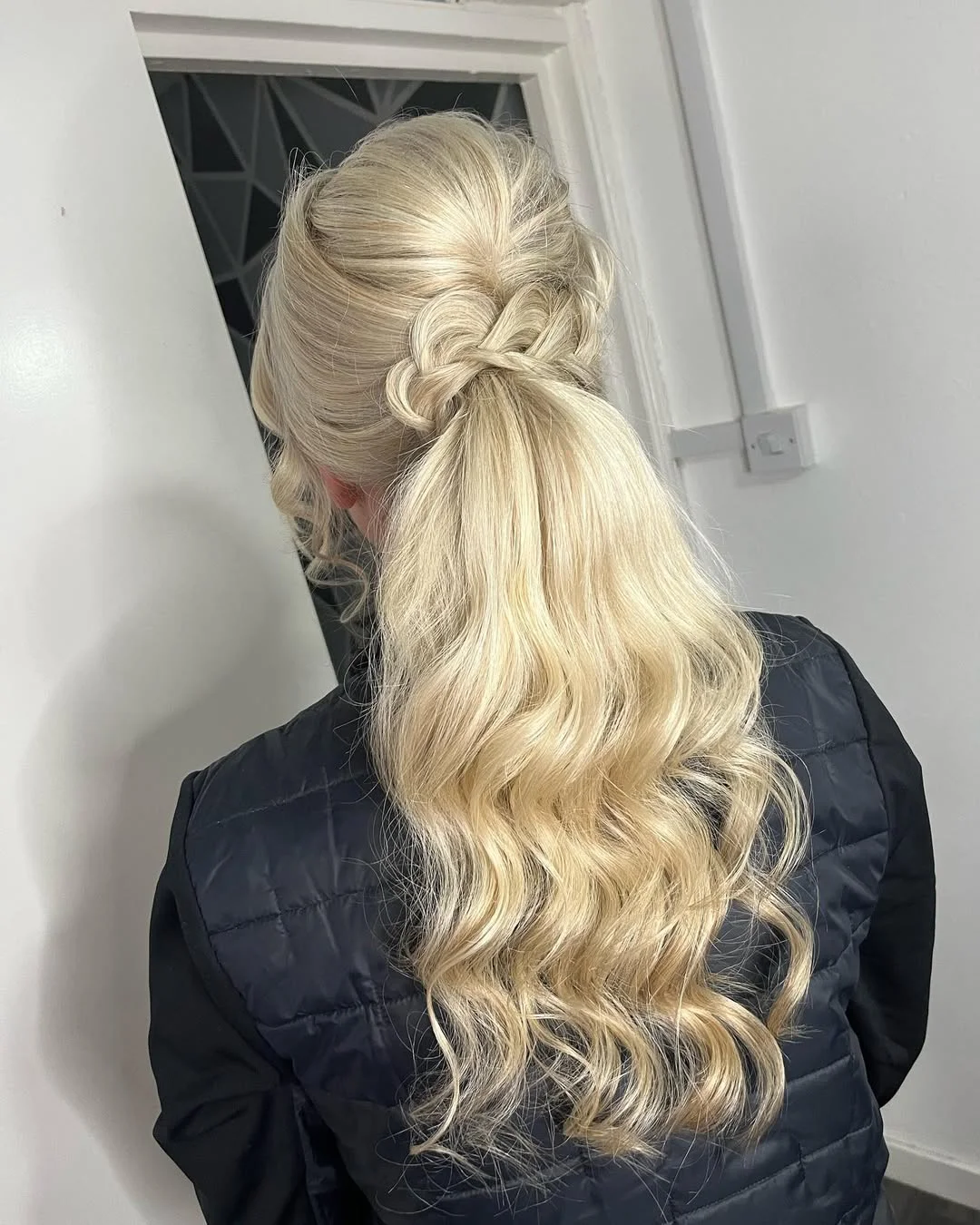 elegant summer wedding guest hairstyles 2026 Soft Ponytail With Twisted Crown