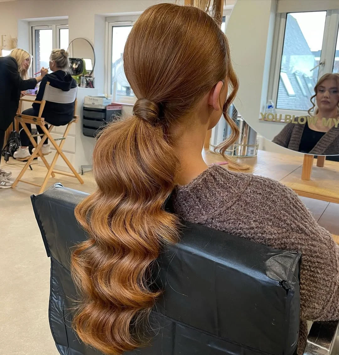 elegant summer wedding guest hairstyles 2026 Glossy Copper Ponytail