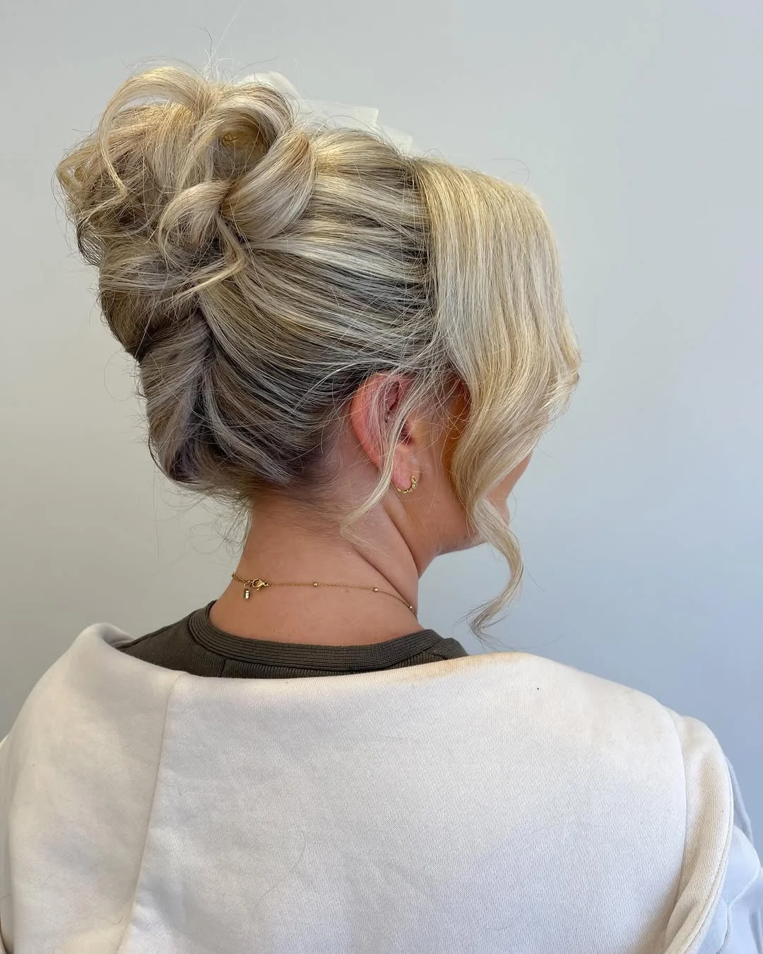 elegant summer wedding guest hairstyles 2026 Romantic Blonde Updo