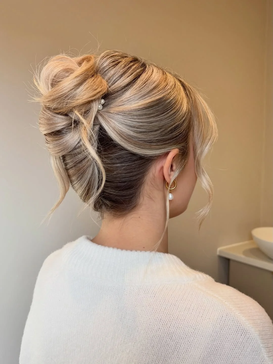 elegant summer wedding guest hairstyles 2026 Soft Twisted Blonde Updo