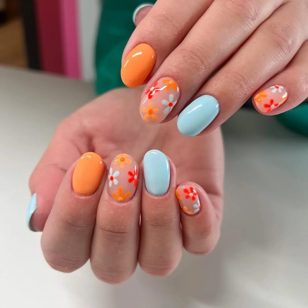 June Nail Colors Ideas 2026 Soft Orange Daisy Nails