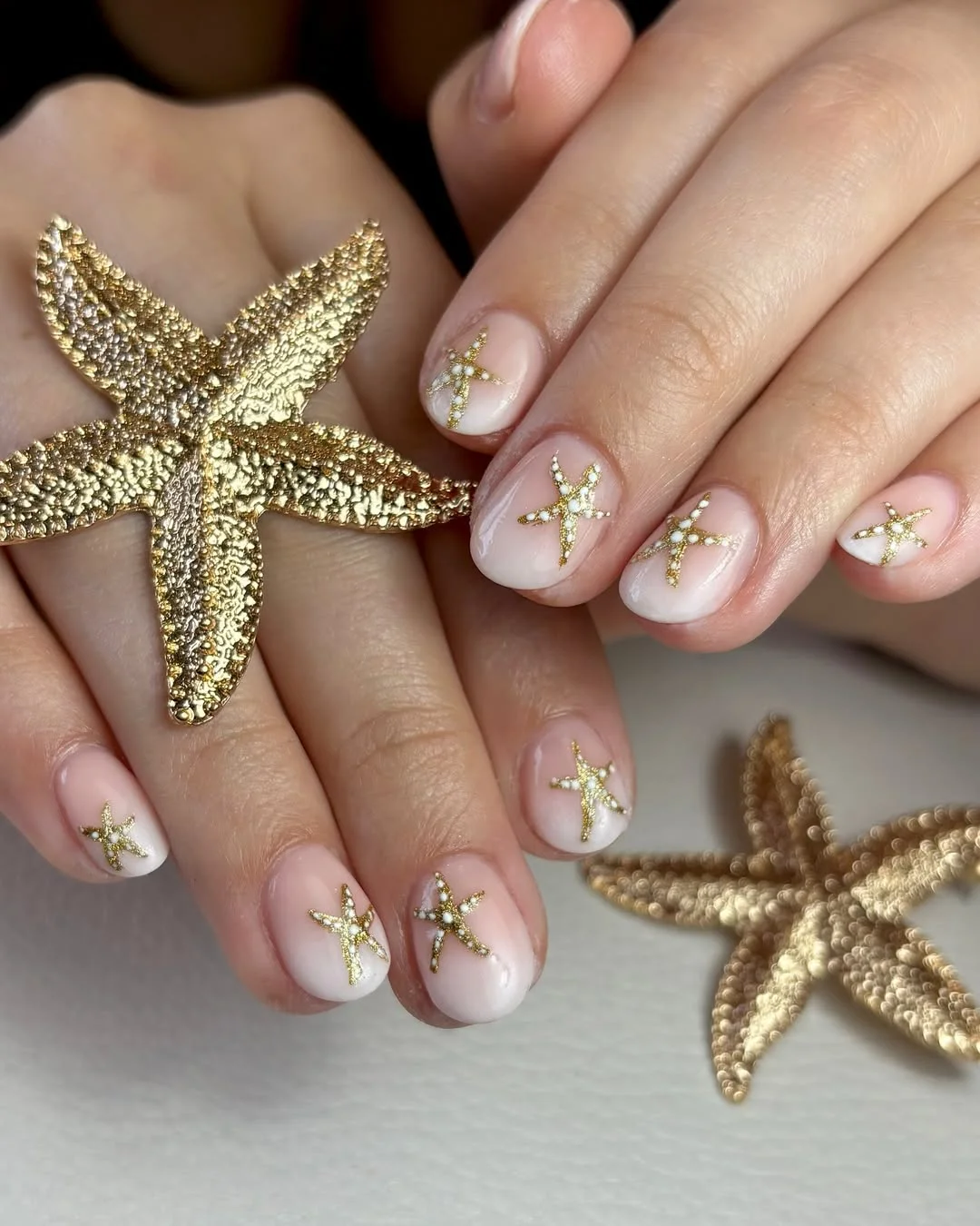 June Nail Colors Ideas 2026 Minimal Gold Starfish Nails