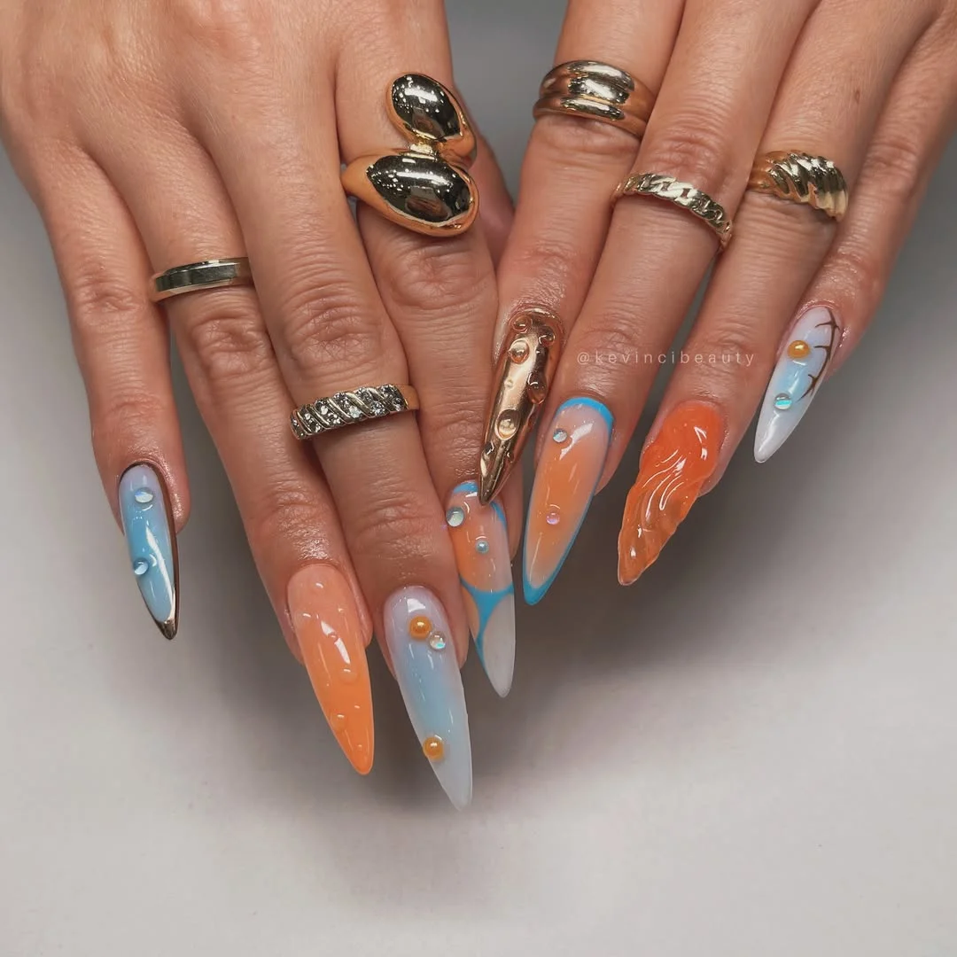 June Nails Ideas 2026 Abstract Blue Orange Stiletto Nails