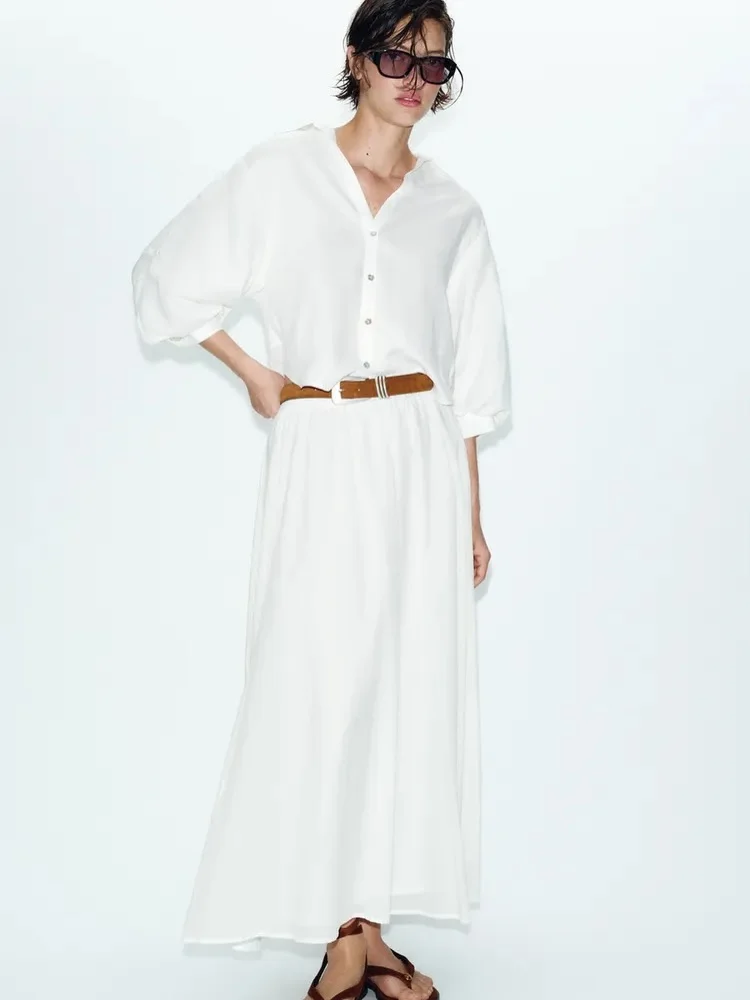 June Outfits Ideas 2026 Flowing White Dresses with Minimalist Summer Elegance