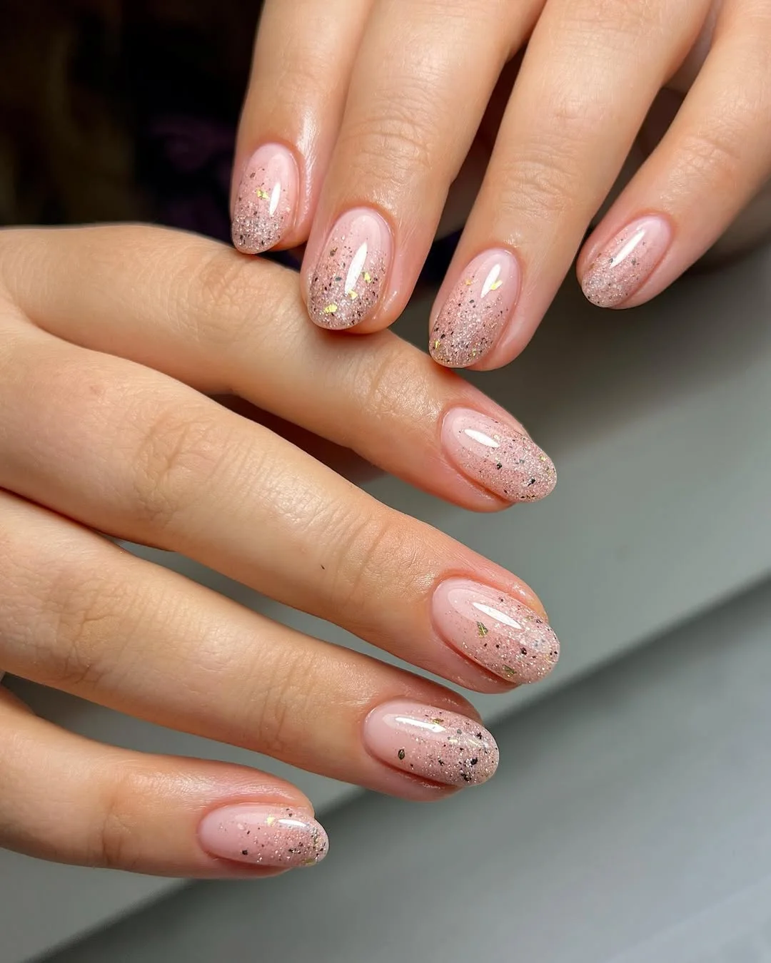 light summer nails 2026 Glazed Pink Glitter Nails With A Soft Gradient Finish