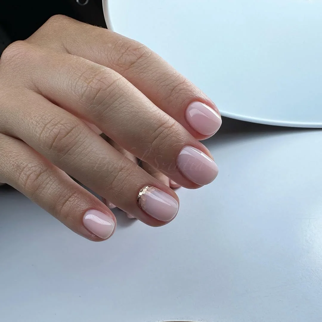 light summer nails 2026 Soft Pink Short Nails With Minimal Gold Accent