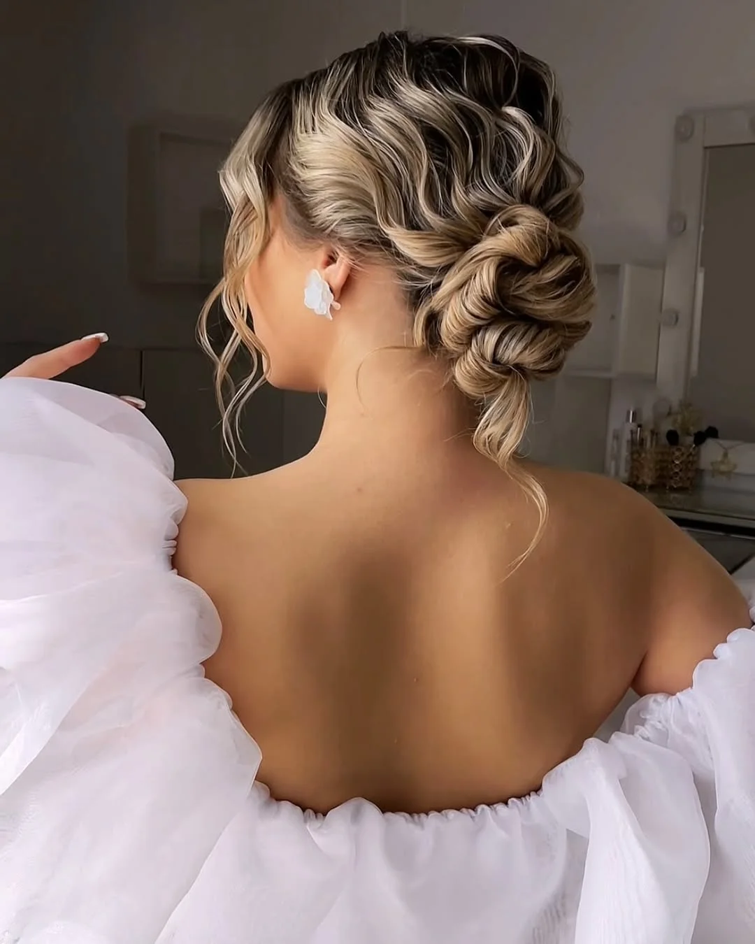messy summer bun hairstyles 2026 Braided Bridal Bun With Soft Contrast