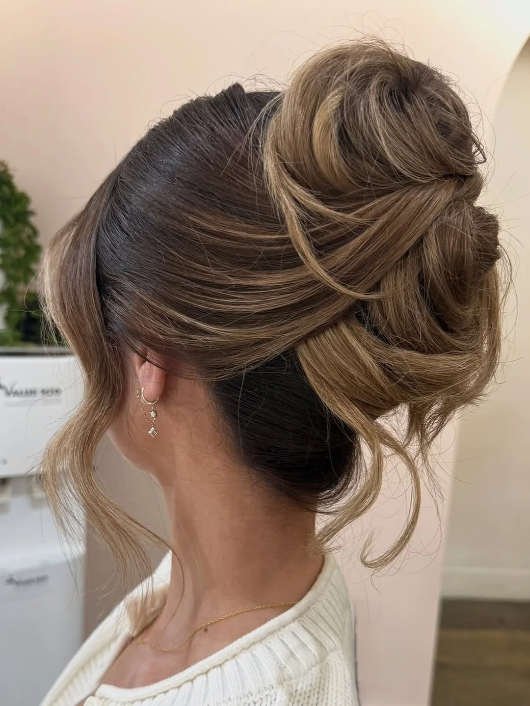messy summer bun hairstyles 2026 Elegant Twisted Bun With Soft Height