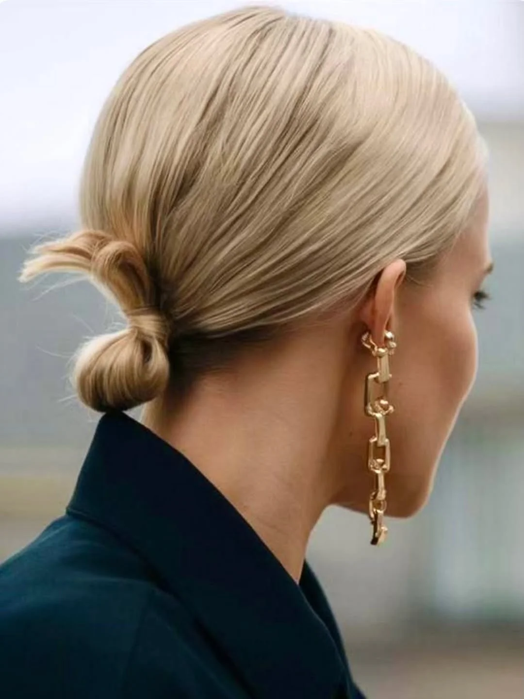 messy summer bun hairstyles 2026 Minimal Blonde Bun With Quiet Luxury Finish