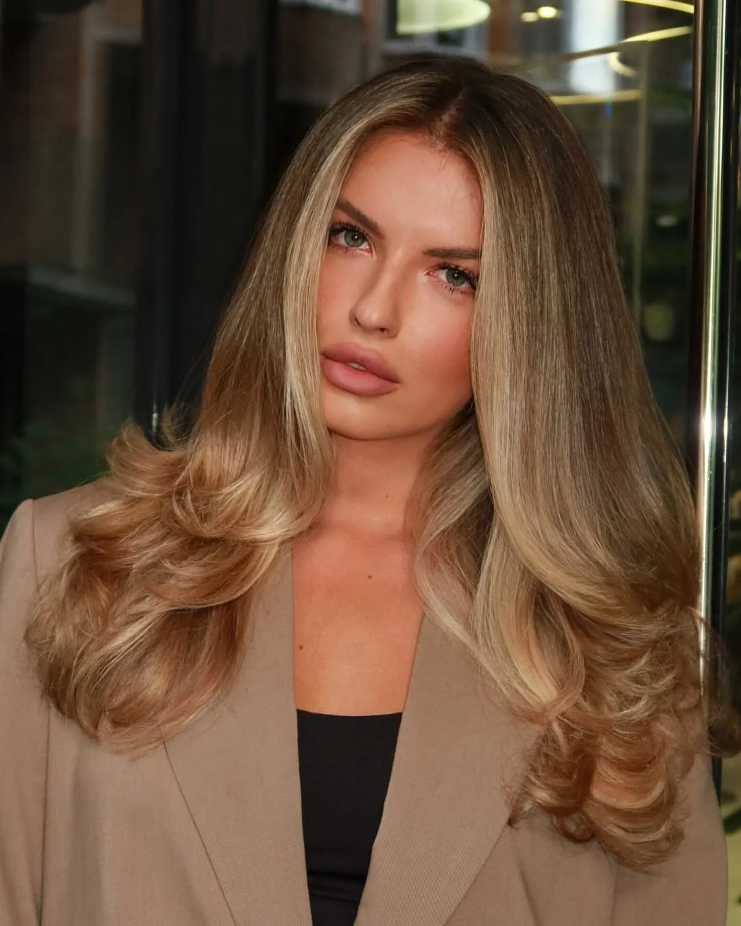 modern summer haircuts for women over 30 2026 Glossy Long Layers with Polished Volume