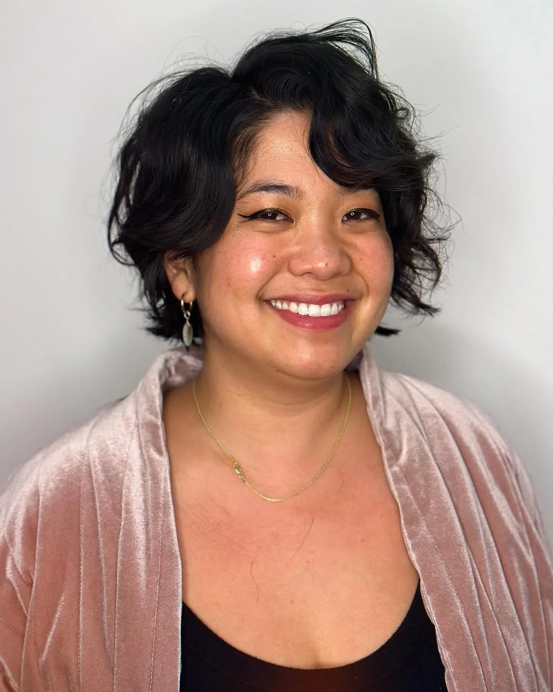 modern summer haircuts for women over 30 2026 Short Curly Bob with Playful Texture