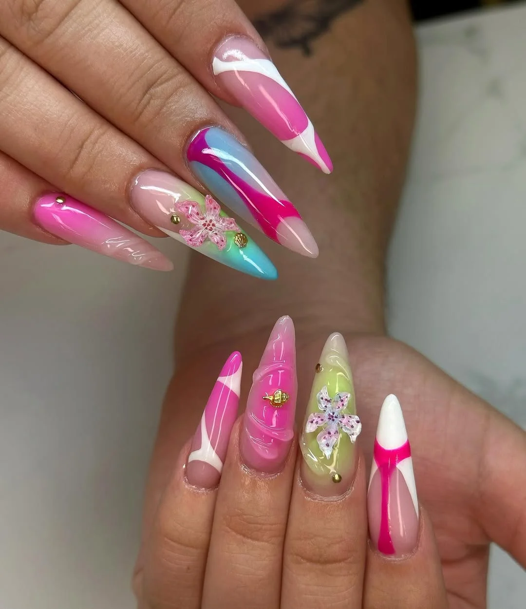 neon summer nails 2026 Pink Swirl Acrylic Nails With Tropical Flower Details