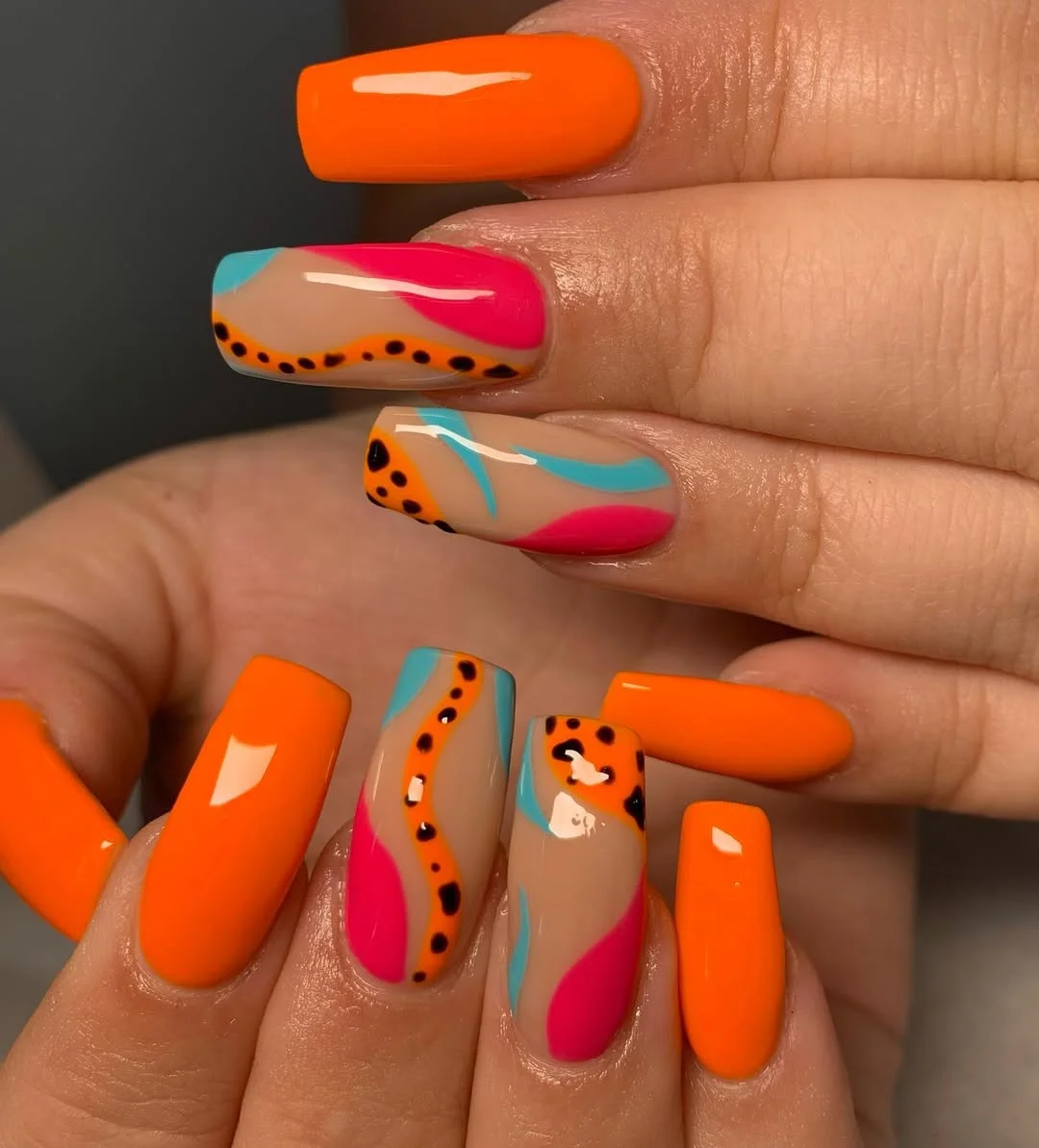 neon summer nails 2026 Bright Orange Abstract Neon Nails