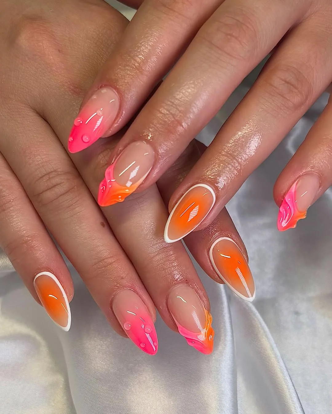 neon summer nails 2026 Pink And Orange Flame French Nails