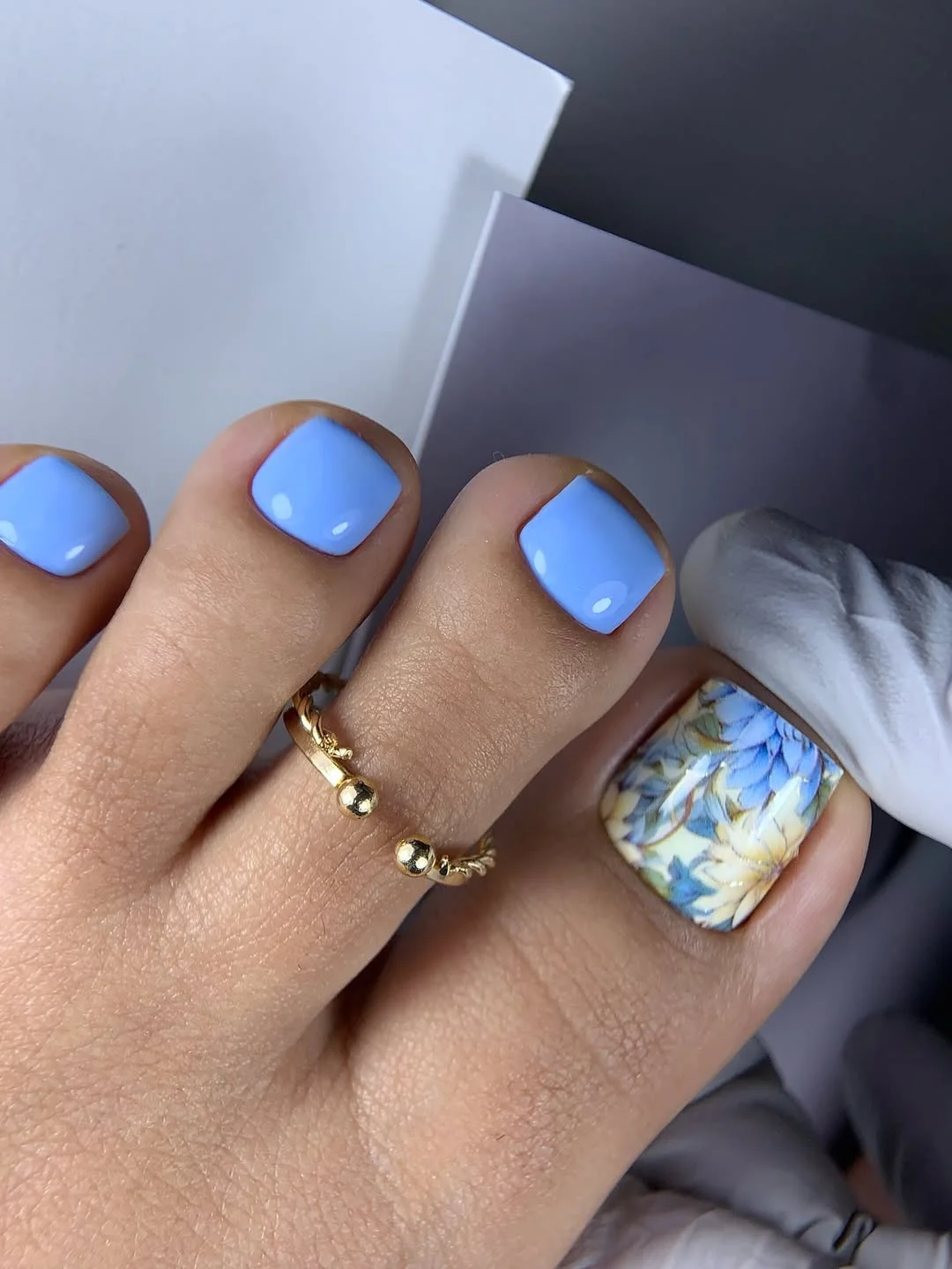 pedicure ideas summer trends 2026 Blue Floral Pedicure With Fresh Coastal Tones