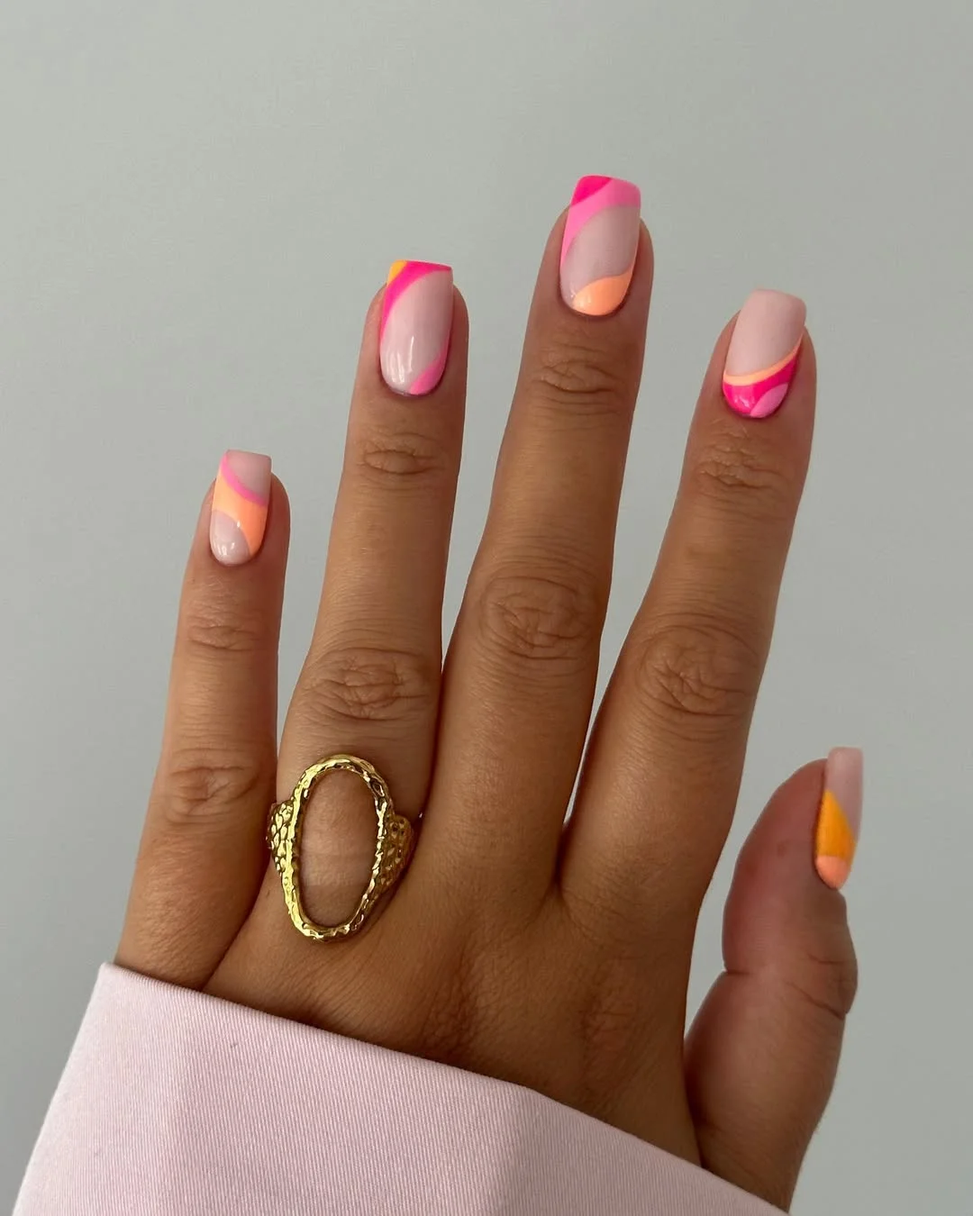 pink summer nails 2026 Neon Pink Waves With Peach Accents