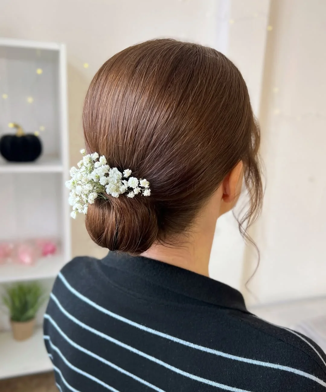 quick summer easy hairstyle 2026 Low Sleek Bun with a Soft Romantic Finish