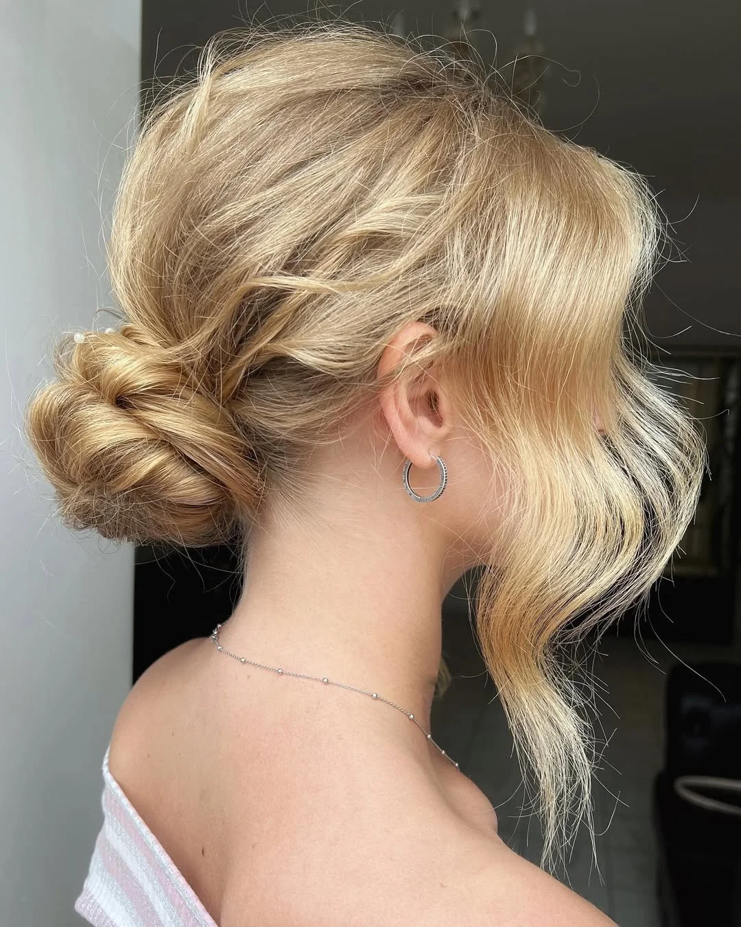 quick summer easy hairstyle 2026 Soft Twisted Bun with Face Framing Layers