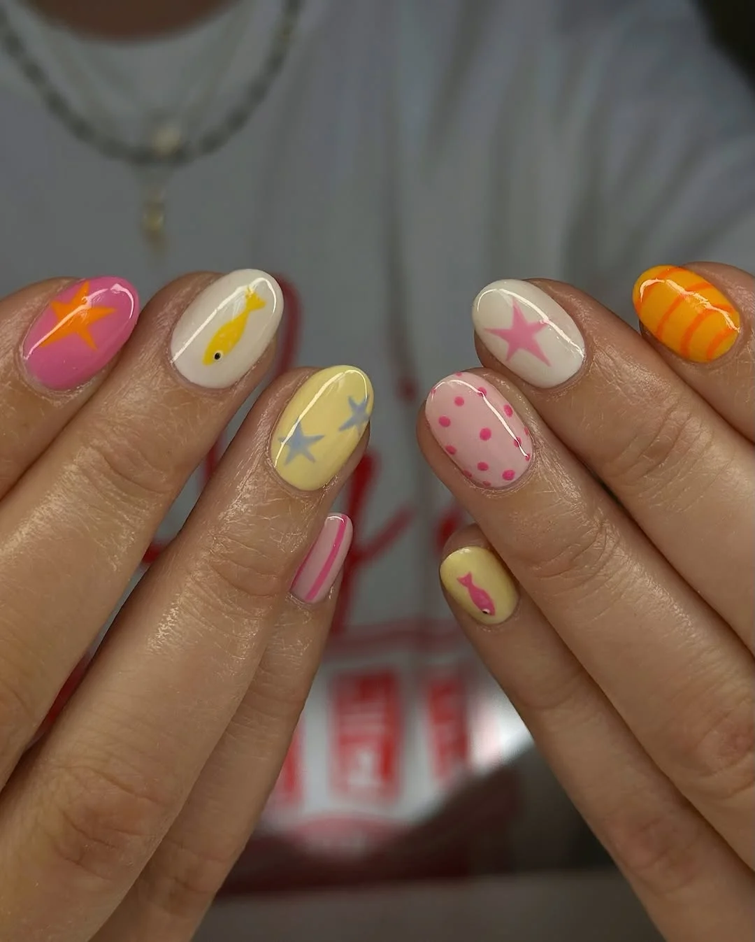 short gel nails summer 2026 Playful Starfish And Candy Color Nail Art