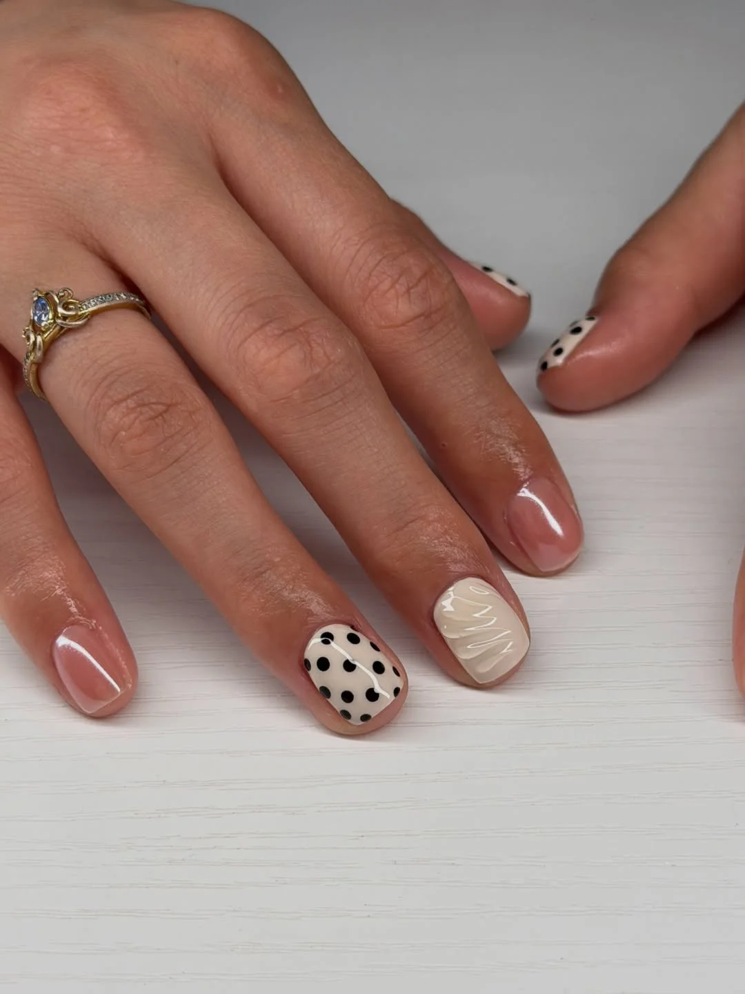 short gel nails summer 2026 Minimal Black And White Polka Dot Nails