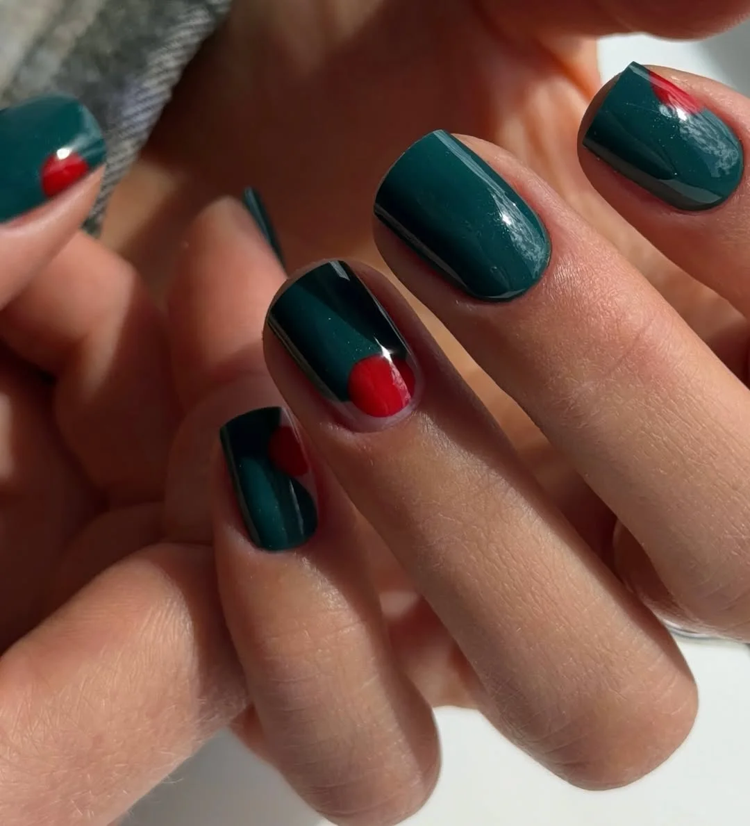 short gel nails summer 2026 Dark Green Glossy Nails With Red Accent