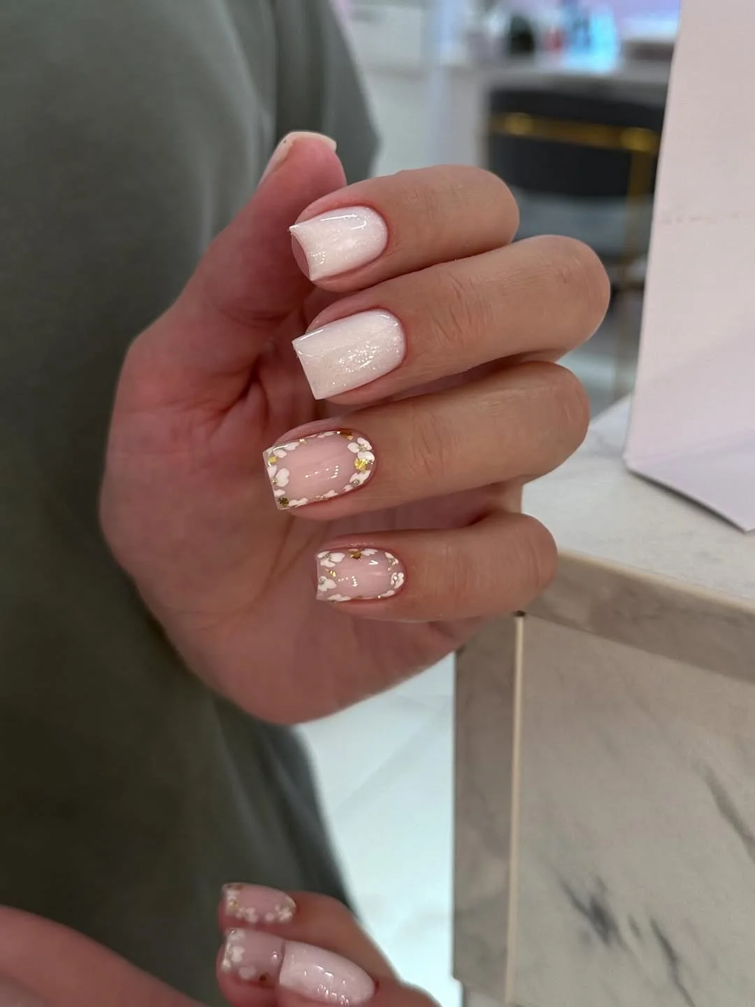 short summer nails 2026 Soft White Floral Glow Nails