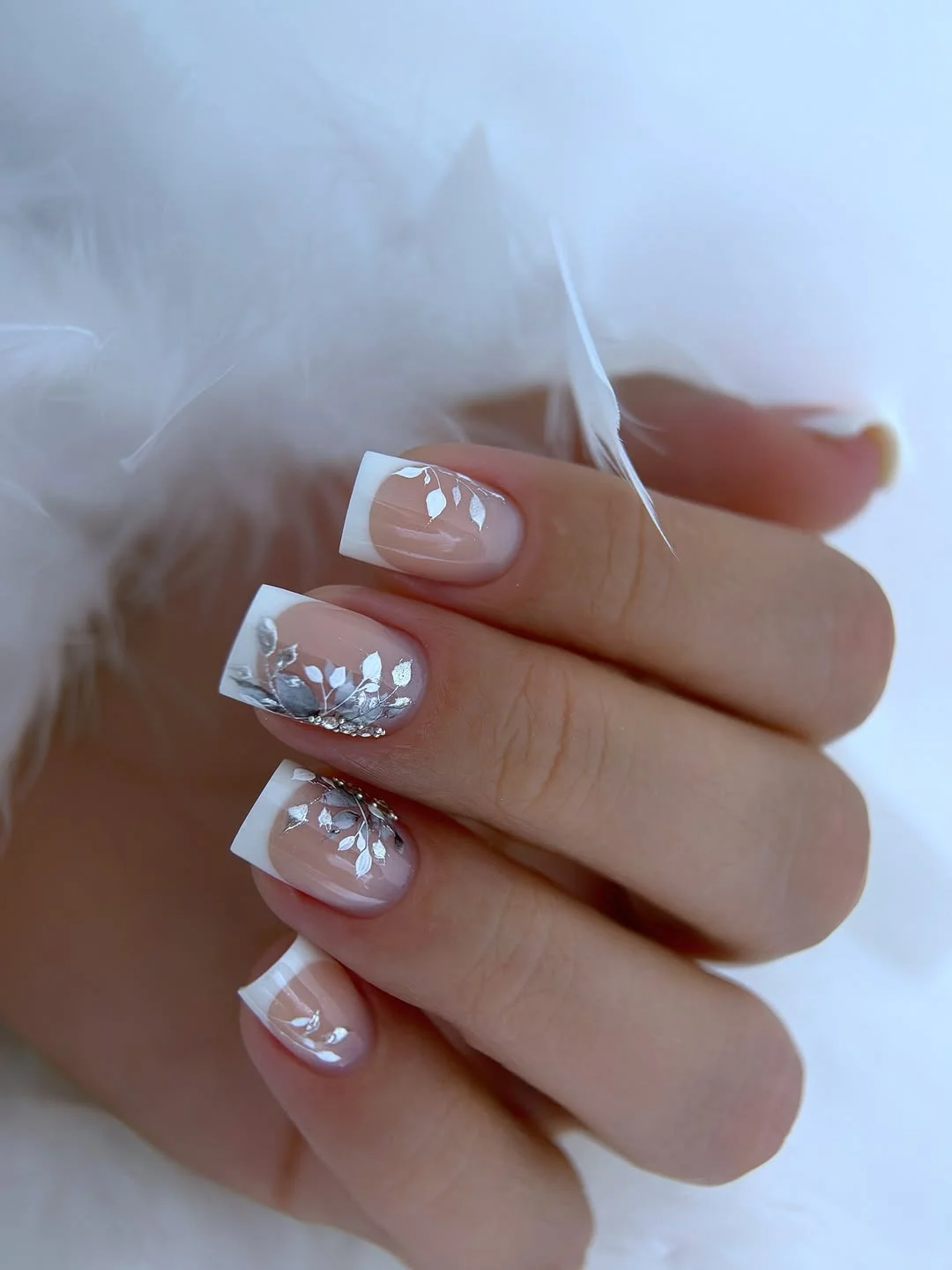 short summer nails 2026 Classic White French Tips With Silver Botanical Details