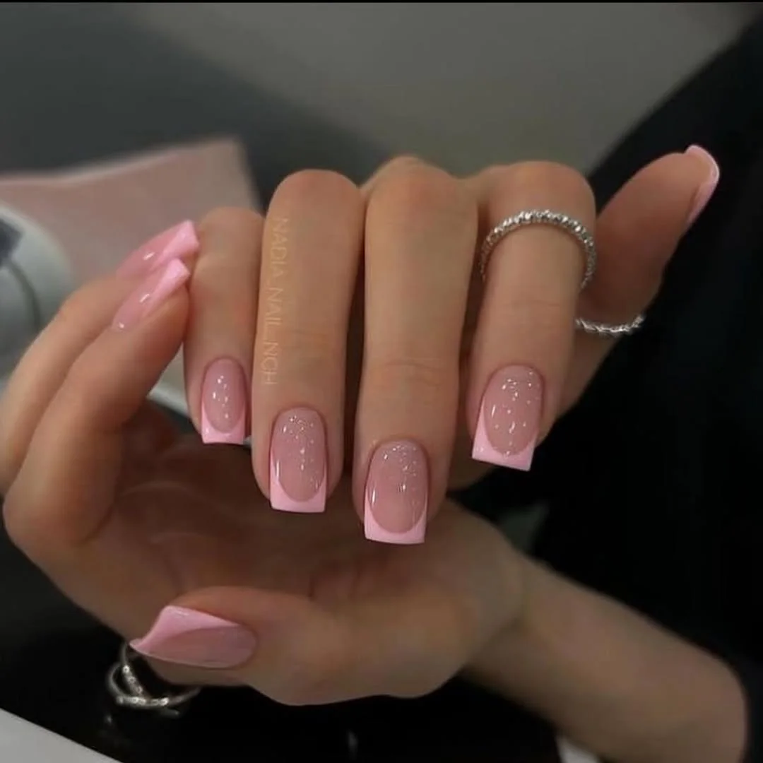 short summer nails 2026 Soft Pink French Tips With a Glossy Candy Finish