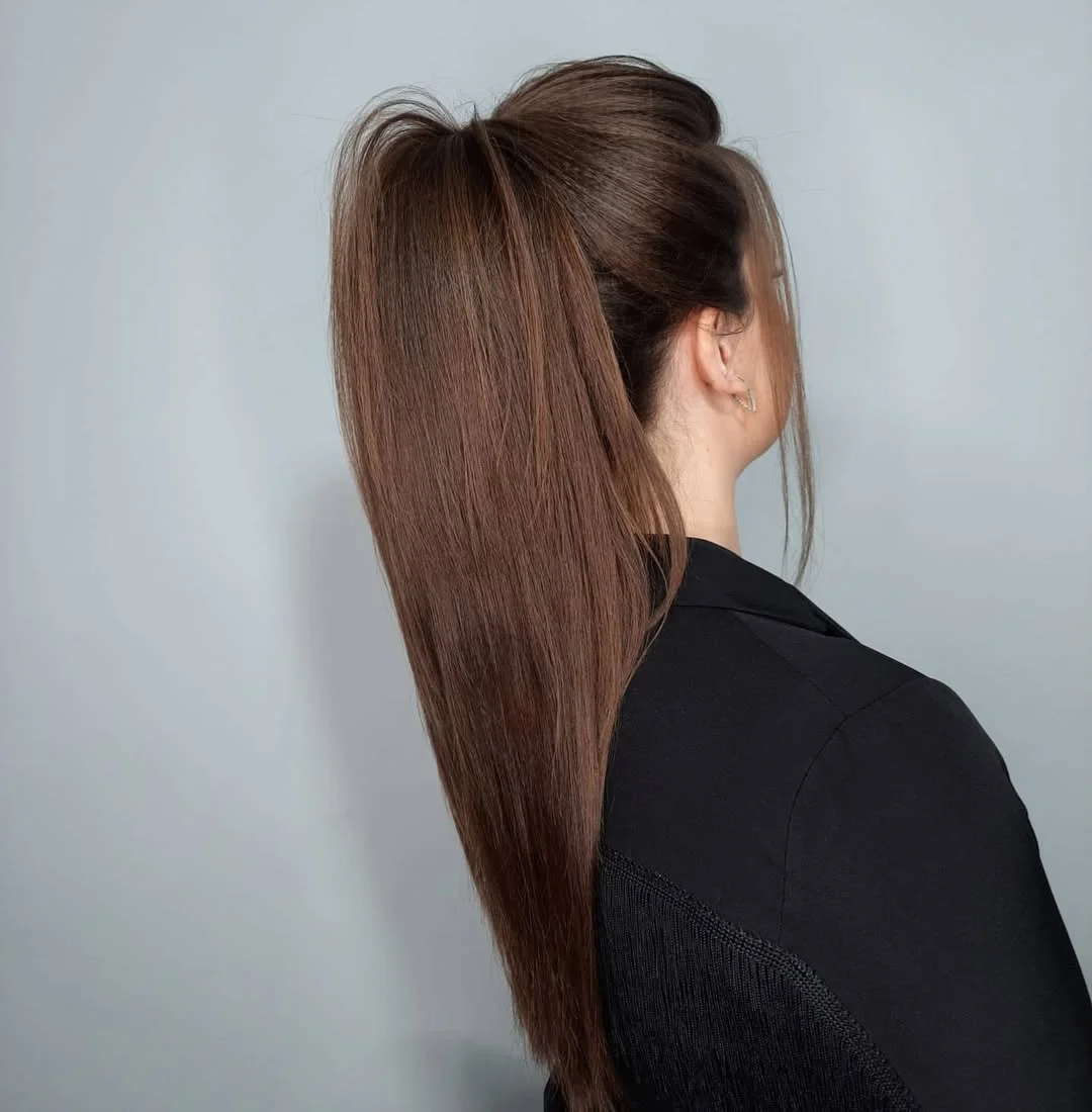 sleek summer ponytail hairstyle 2026 High sleek ponytail with soft lift