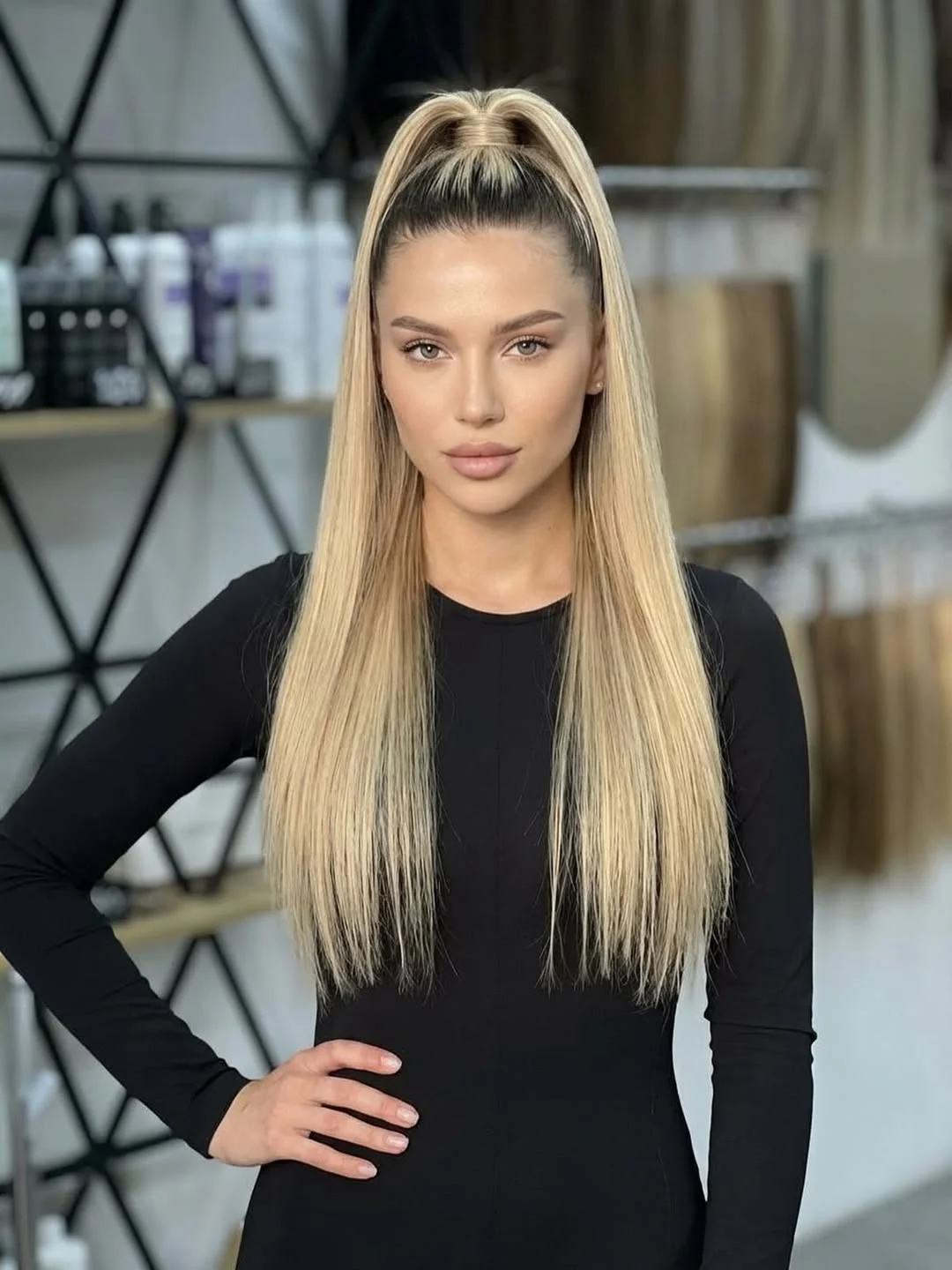 sleek summer ponytail hairstyle 2026 Centered high ponytail with ultra straight length