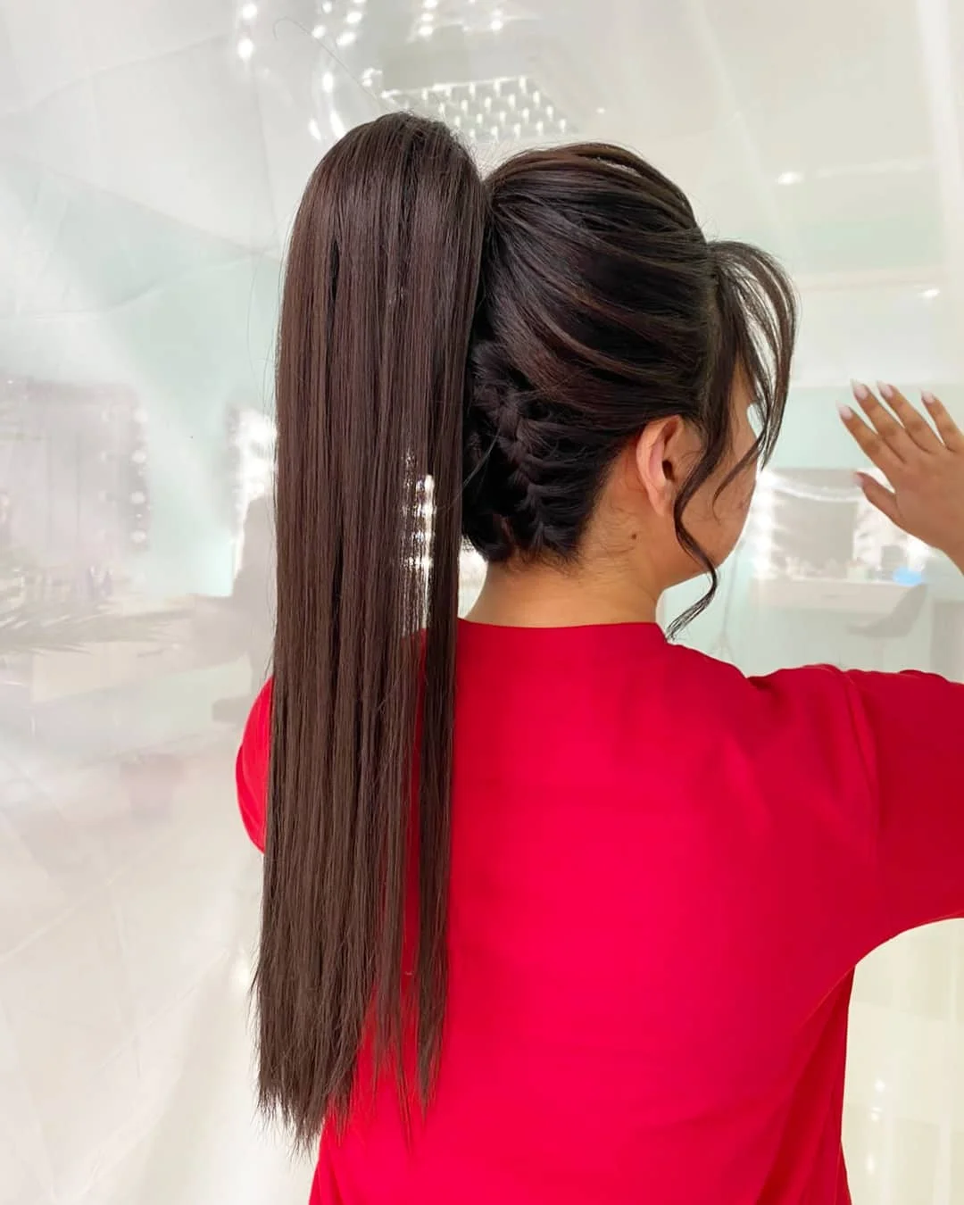 sleek summer ponytail hairstyle 2026 Sleek ponytail with hidden braid structure