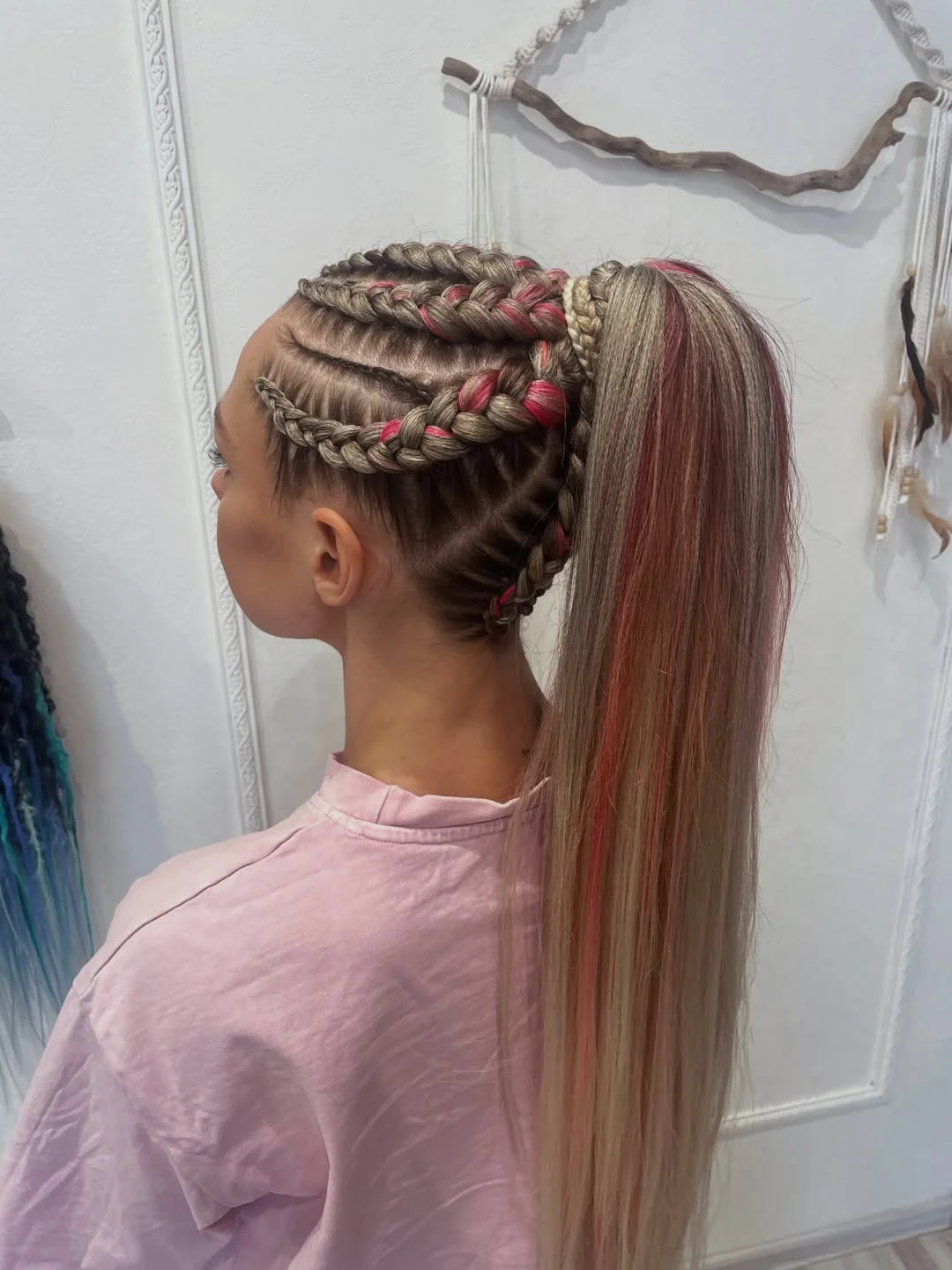 sleek summer ponytail hairstyle 2026 High braided ponytail with bold color accents