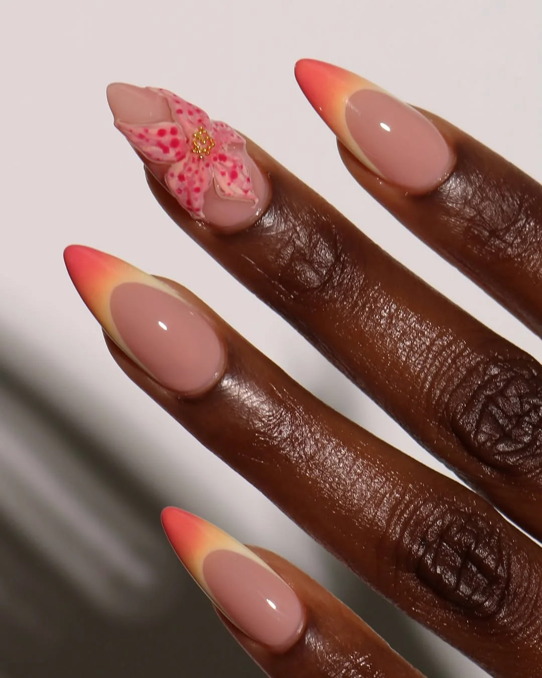 summer acrylic nails 2026 Soft Sunset French Tips With Floral Accent