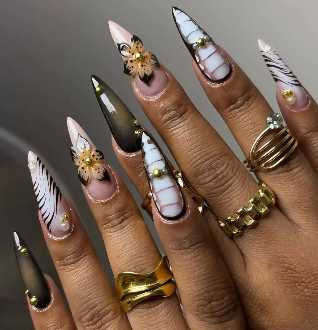summer acrylic nails 2026 Black And White Floral Stiletto Nails