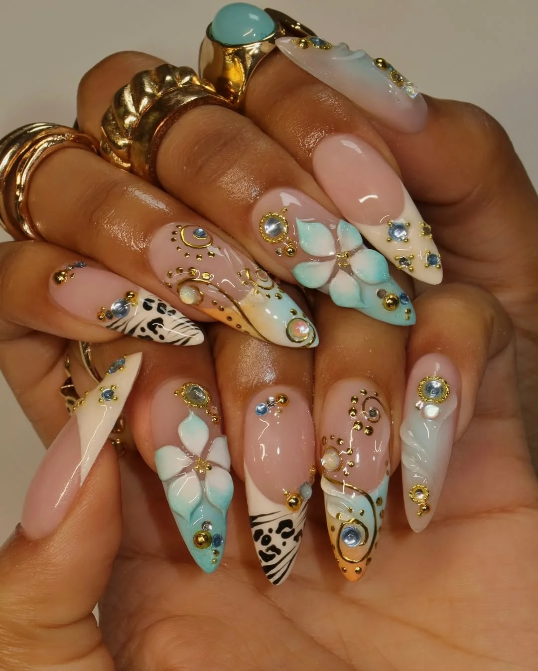 summer almond nails 2026 Luxury Blue Florals With Ornate Gold Details